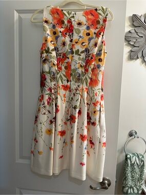 Sleeveless White Floral A-Line Dress with Orange & Yellow Blooms